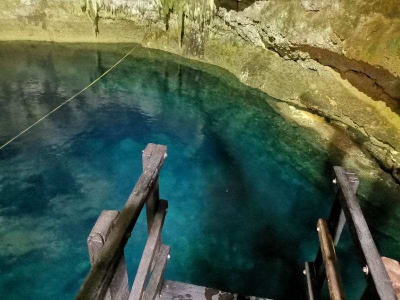 Looking down from the 10-meter jumping platform at Cenote Tankach-Ha near Coba