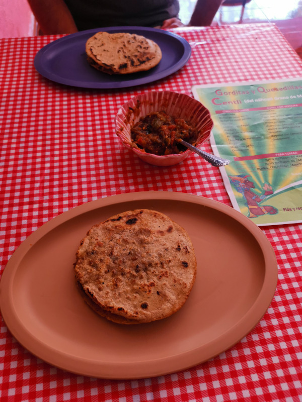 Gorditas on plates on a table