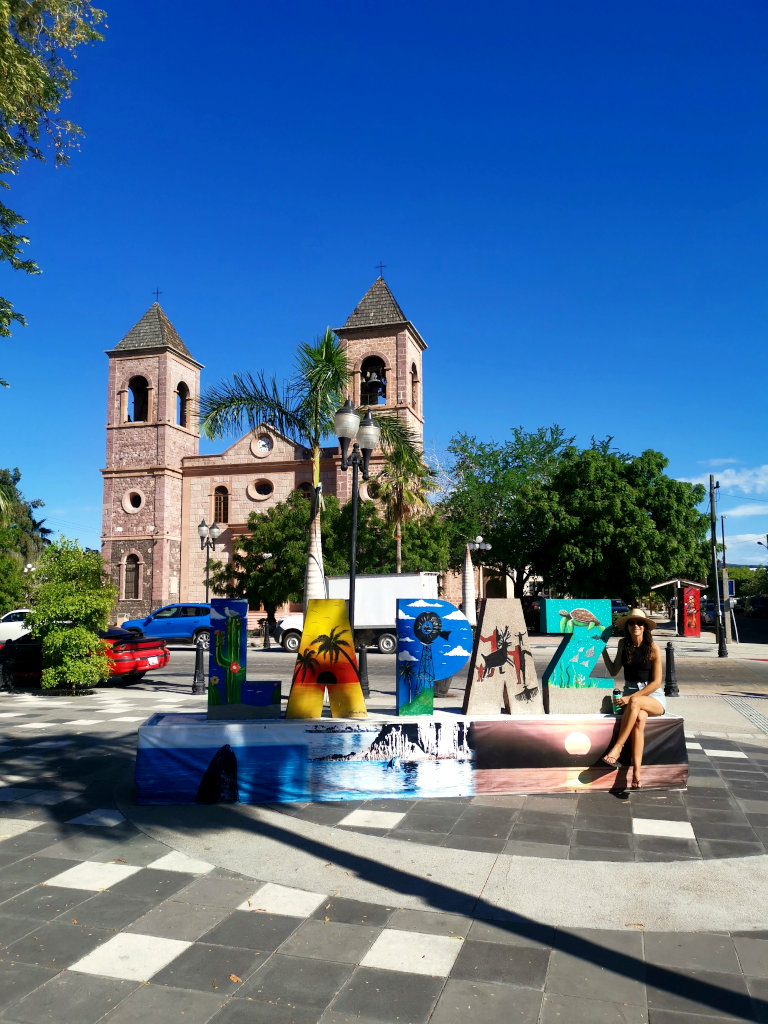 La Paz sign in front of the church at the main square
